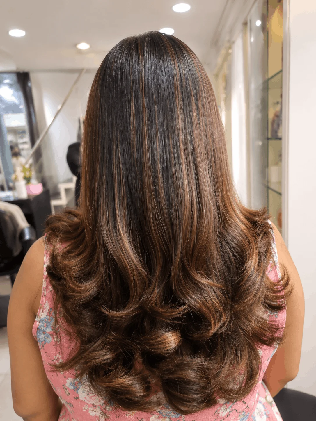 Soft curled hair styling at Veena'z salon near me